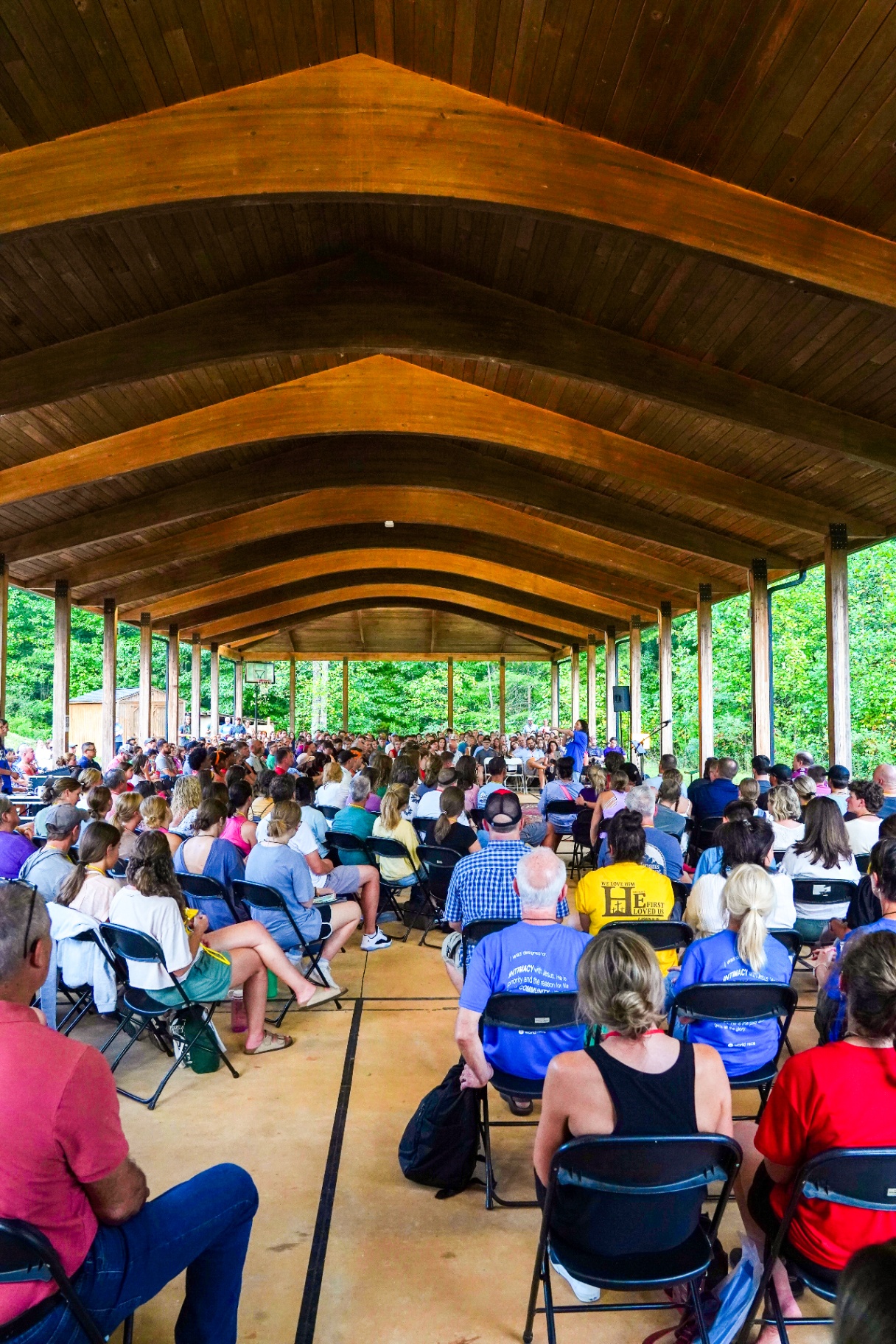 A large gathering under the pavilion for a training camp session