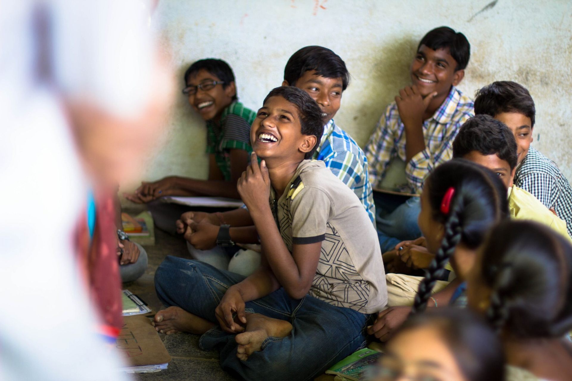 Indian children laughing during a teaching
