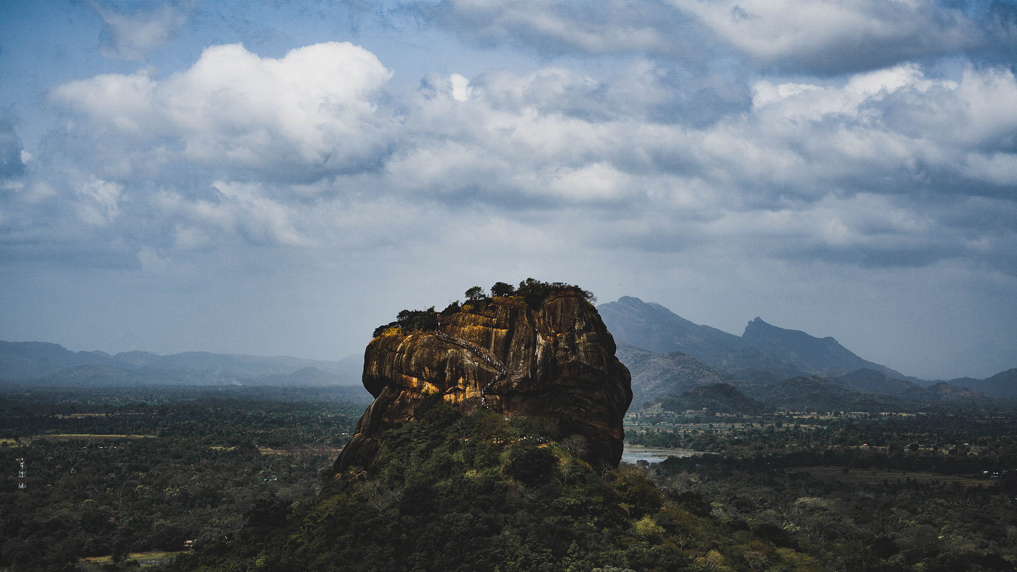 Sigiriya rock fortress rising above the jungle in Sri Lanka