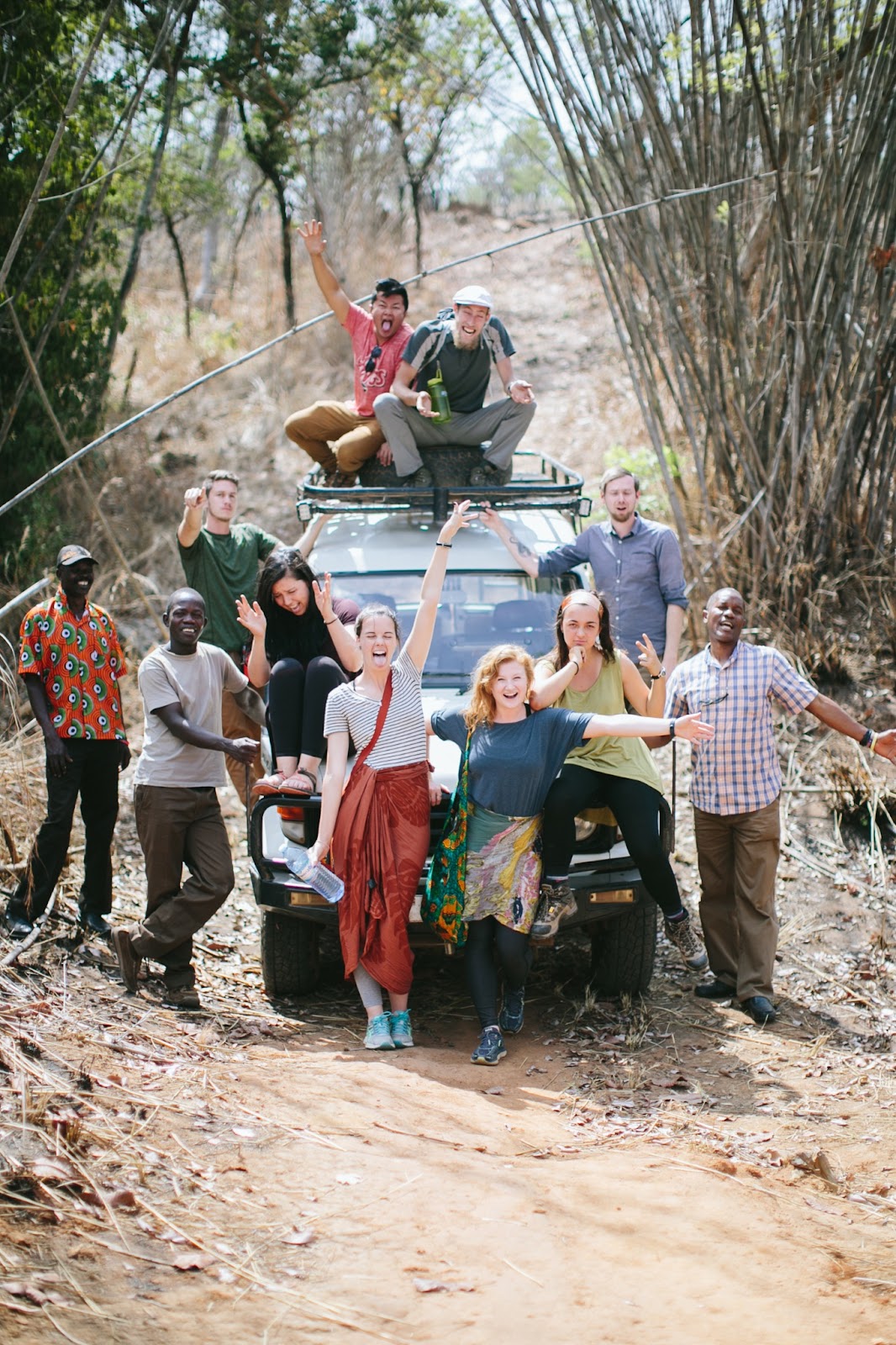 Squad piled on a Land Cruiser in the Ugandan bush